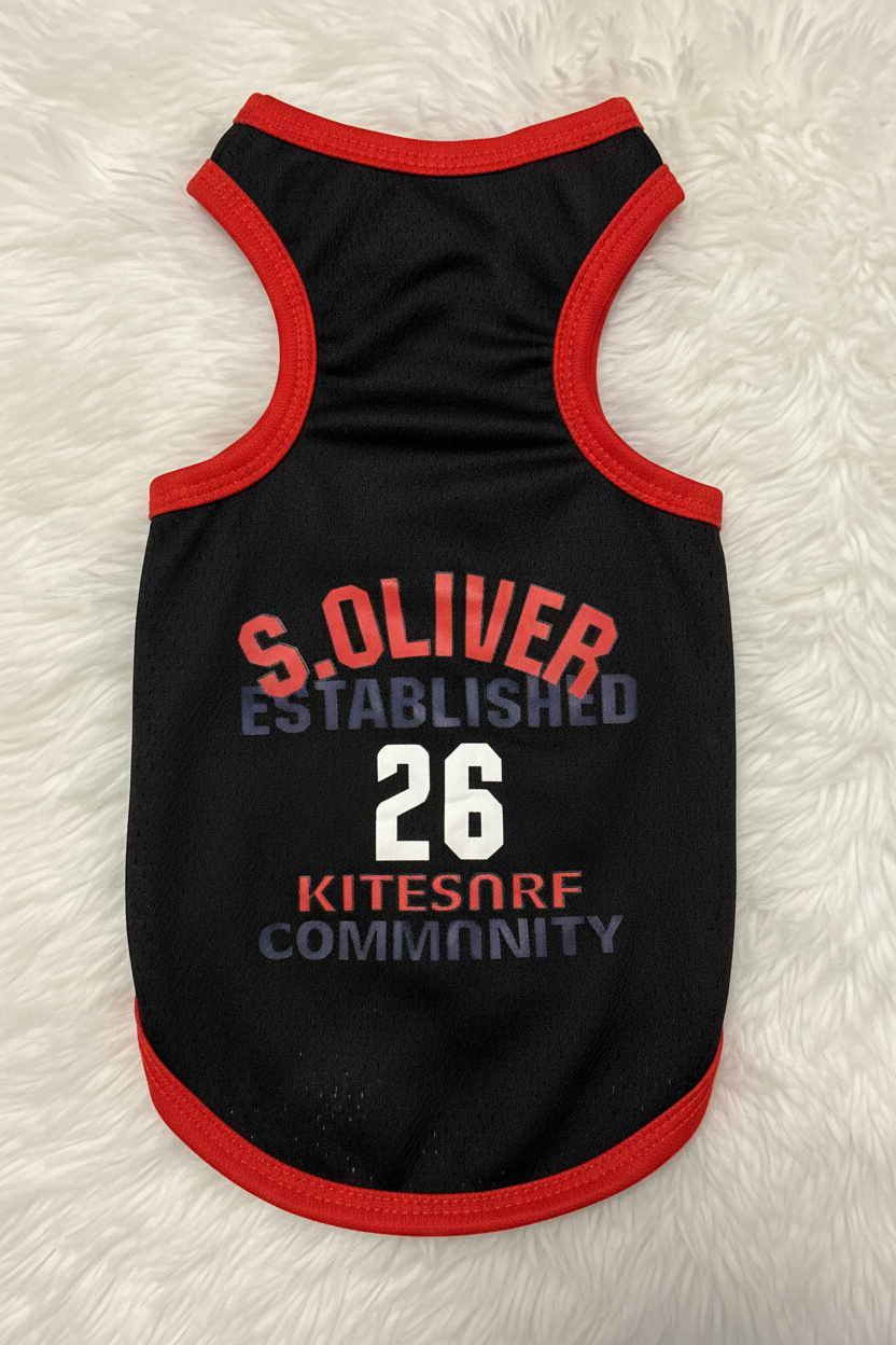 Black pet tank top with red trim and text on a white fluffy background